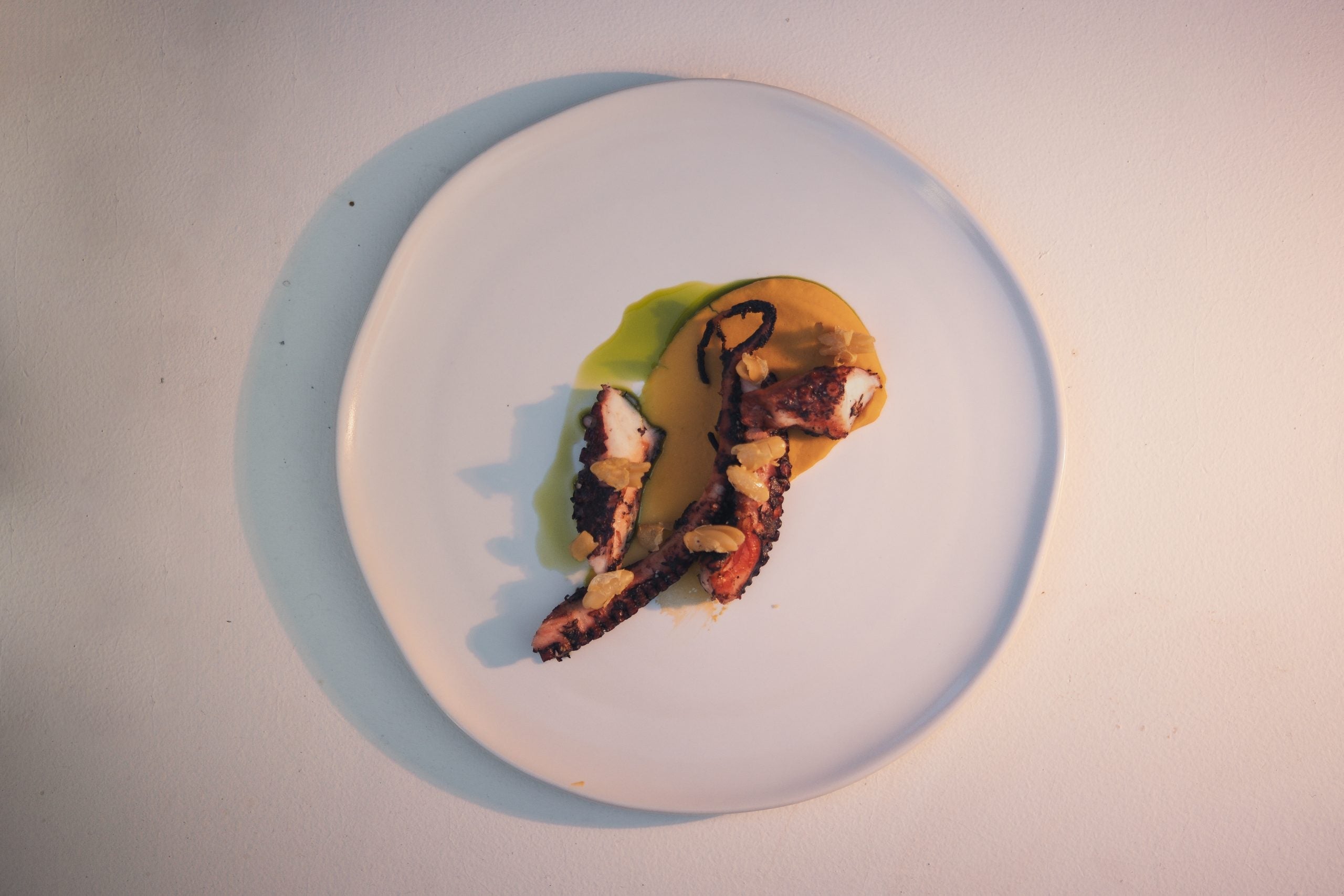 Dinner at AVLI, a modern Greek courtyard restaurant in Uluwatu, Bali