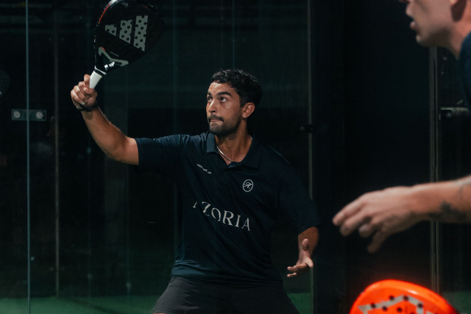 Padel doubles on an enclosed glass court at Azoria Uluwatu