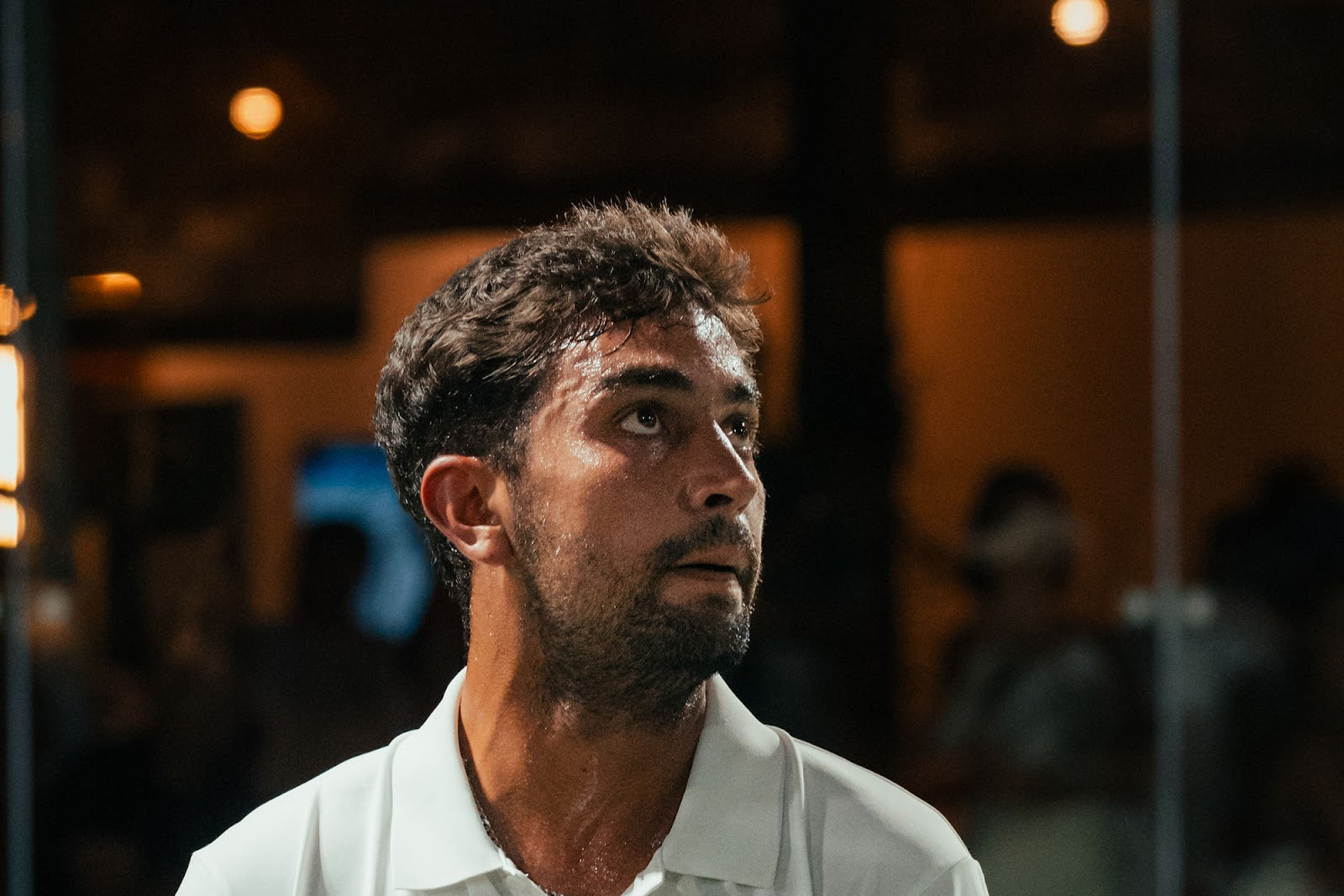 Padel player in Azoria Padel Club kit holding a racket in Uluwatu