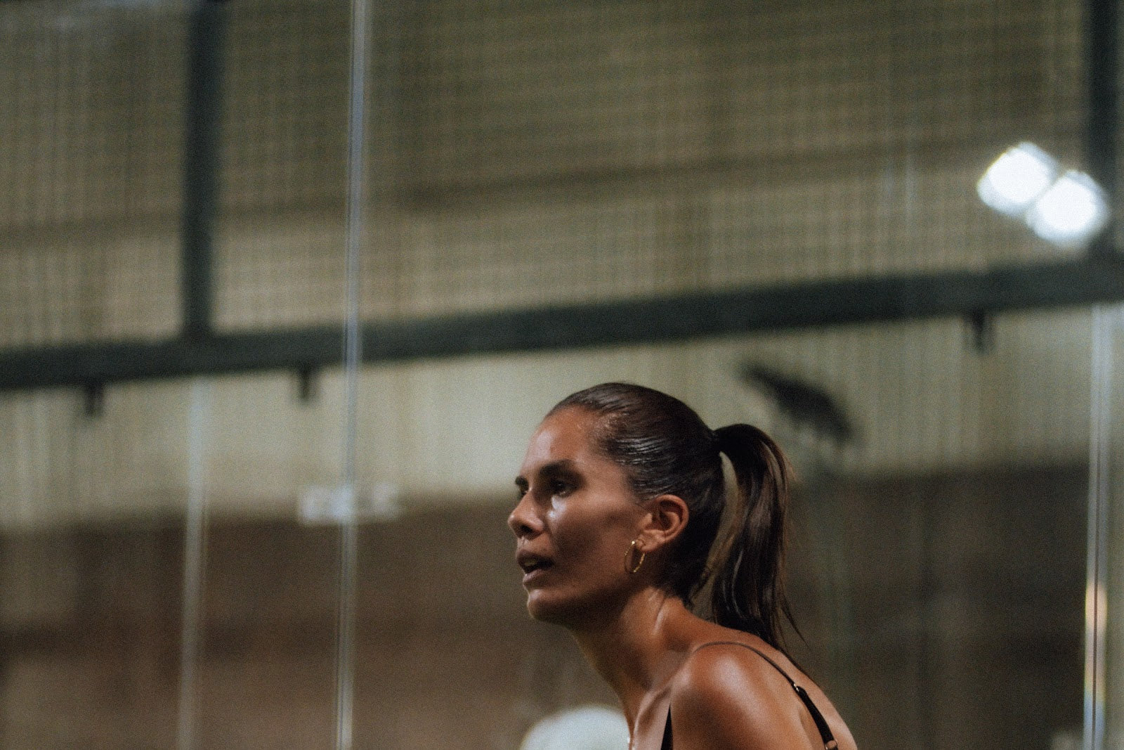 Padel rally on an enclosed court at Azoria in Uluwatu, Bali