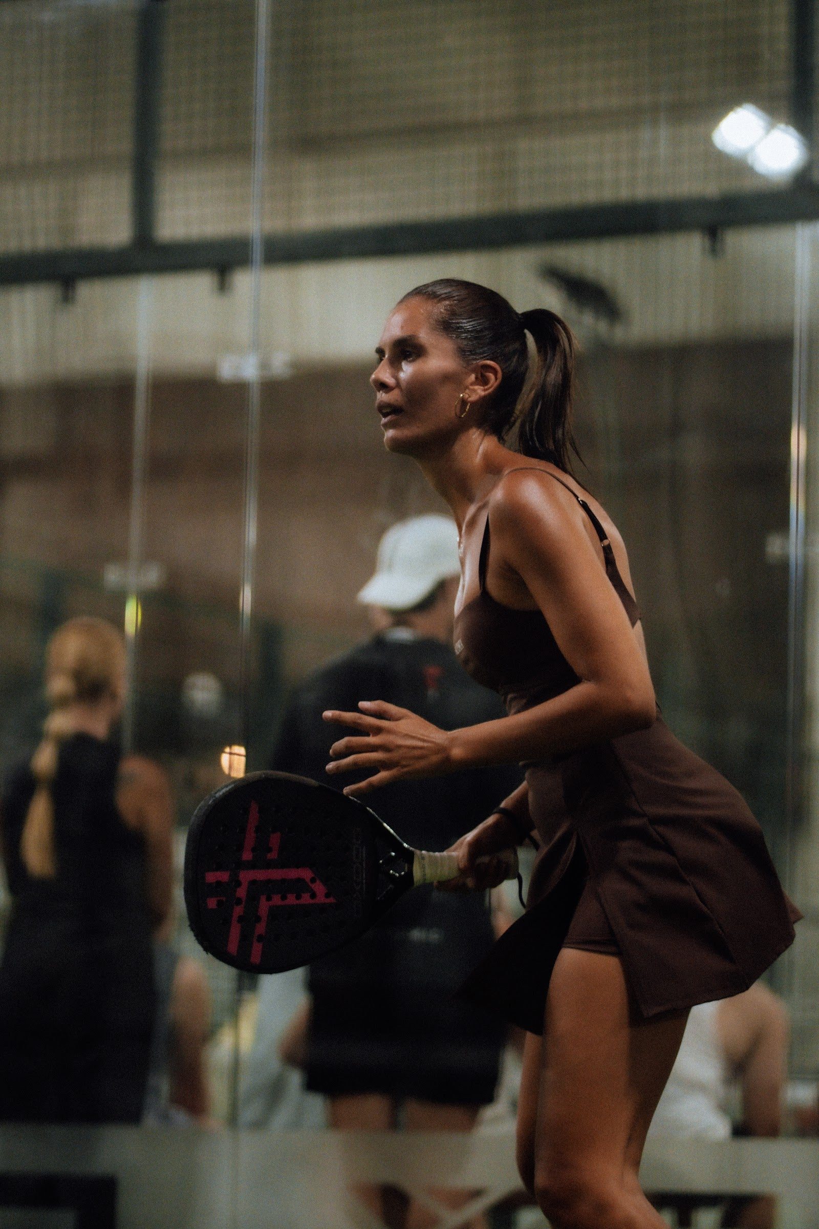 Padel rally on an enclosed court at Azoria in Uluwatu, Bali