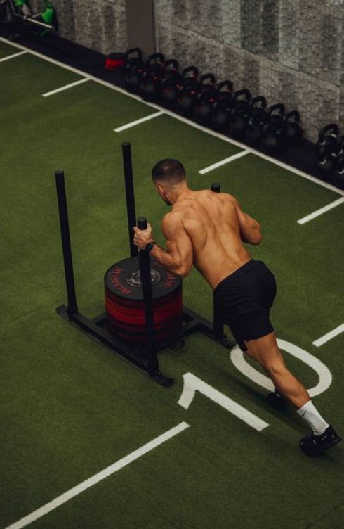 Fitness sled push strength training — Azoria, Uluwatu, Bali
