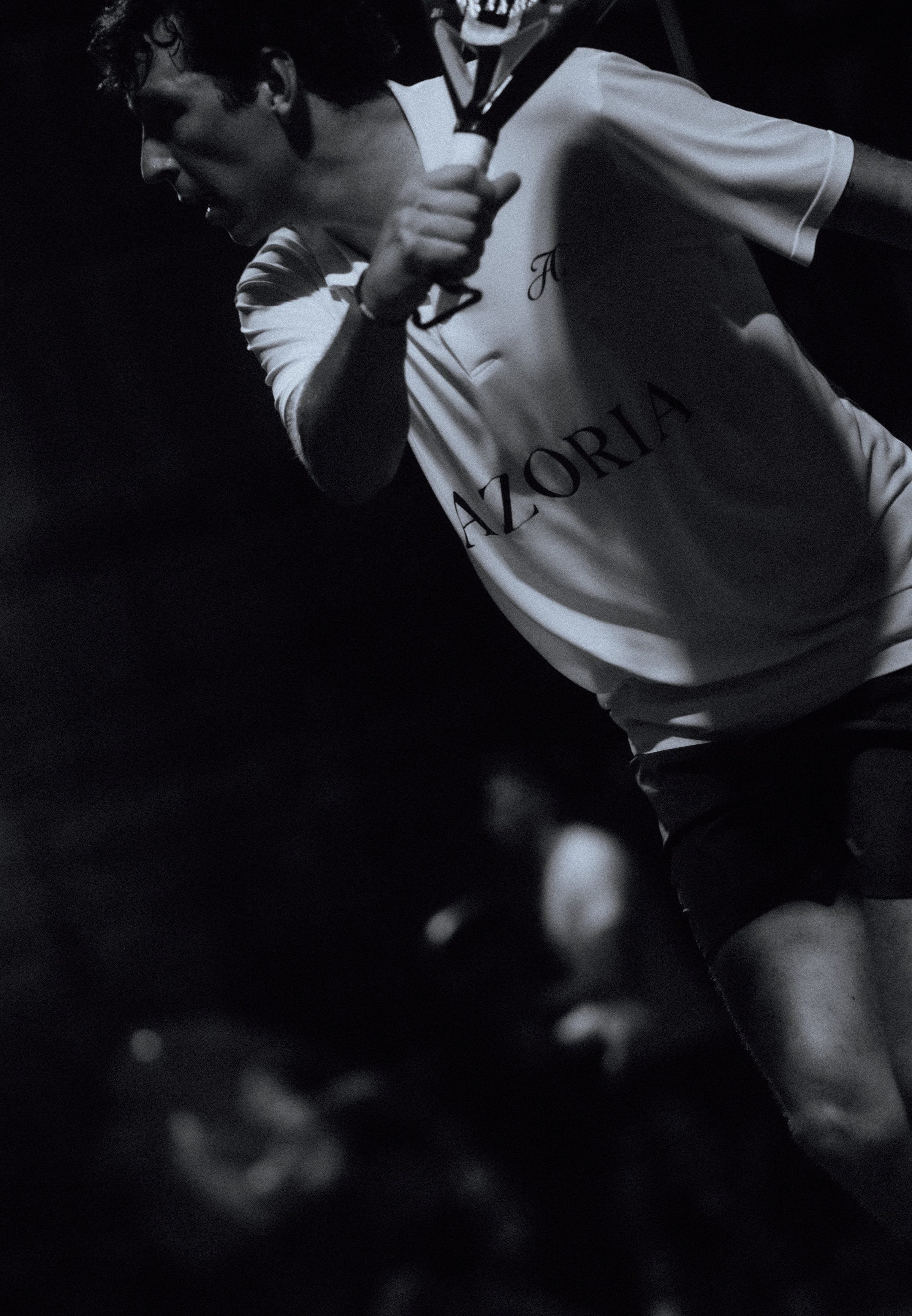 Padel player backhand black white — Azoria, Uluwatu, Bali