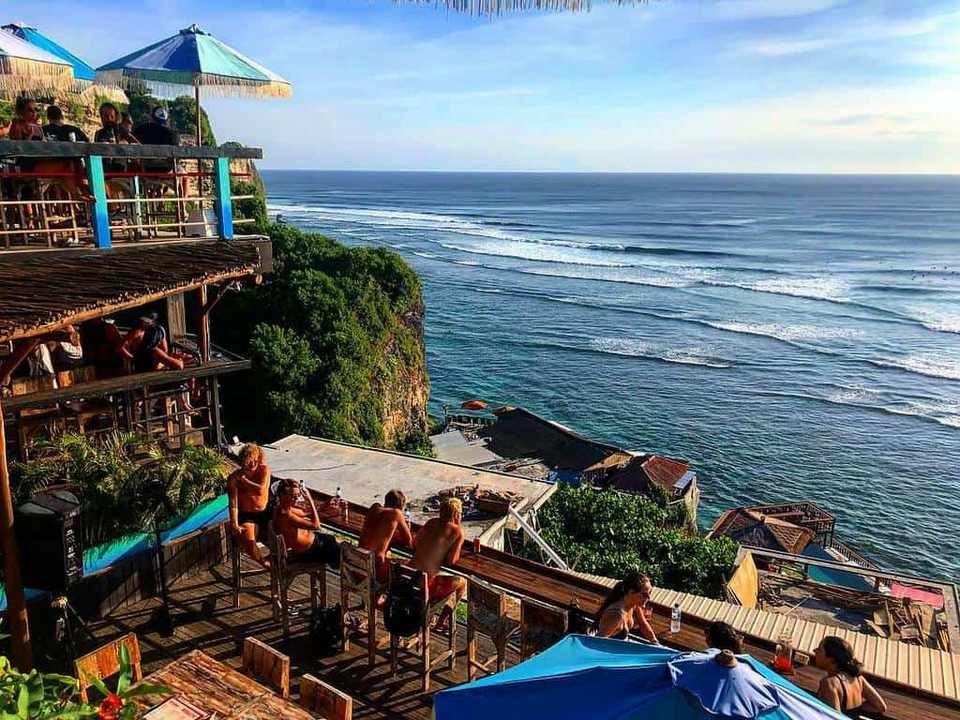 Uluwatu clifftop beach club ocean — Azoria, Uluwatu, Bali
